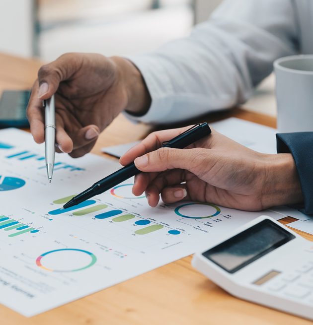 business-people-accounting-working-with-analysis-i-6BEKTNY